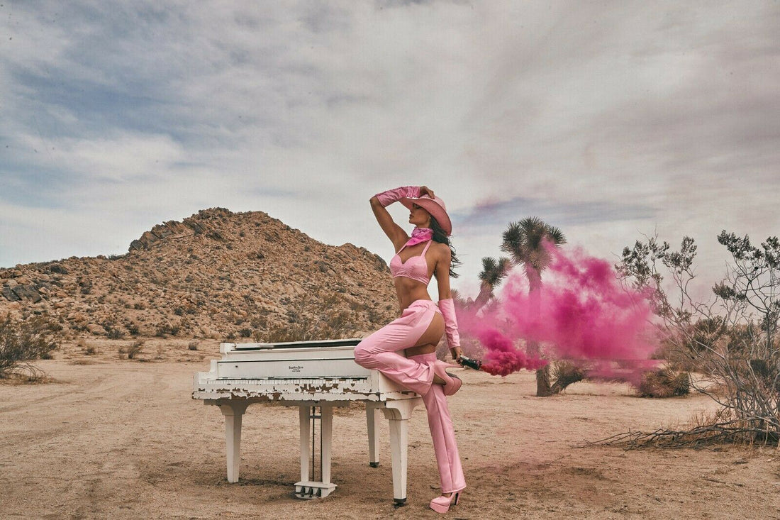 Roma Sheriff Shine Pink Cowgirl Costume in the desert with pink smoke
